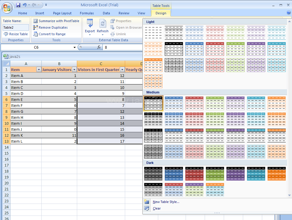 Select a cell or range in the table. Click the Design tab under Table Tools, click the More arrow under Table Styles, and then select a table style.