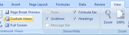 Click the View tab. Click the Custom Views button. Click the view you want to display.